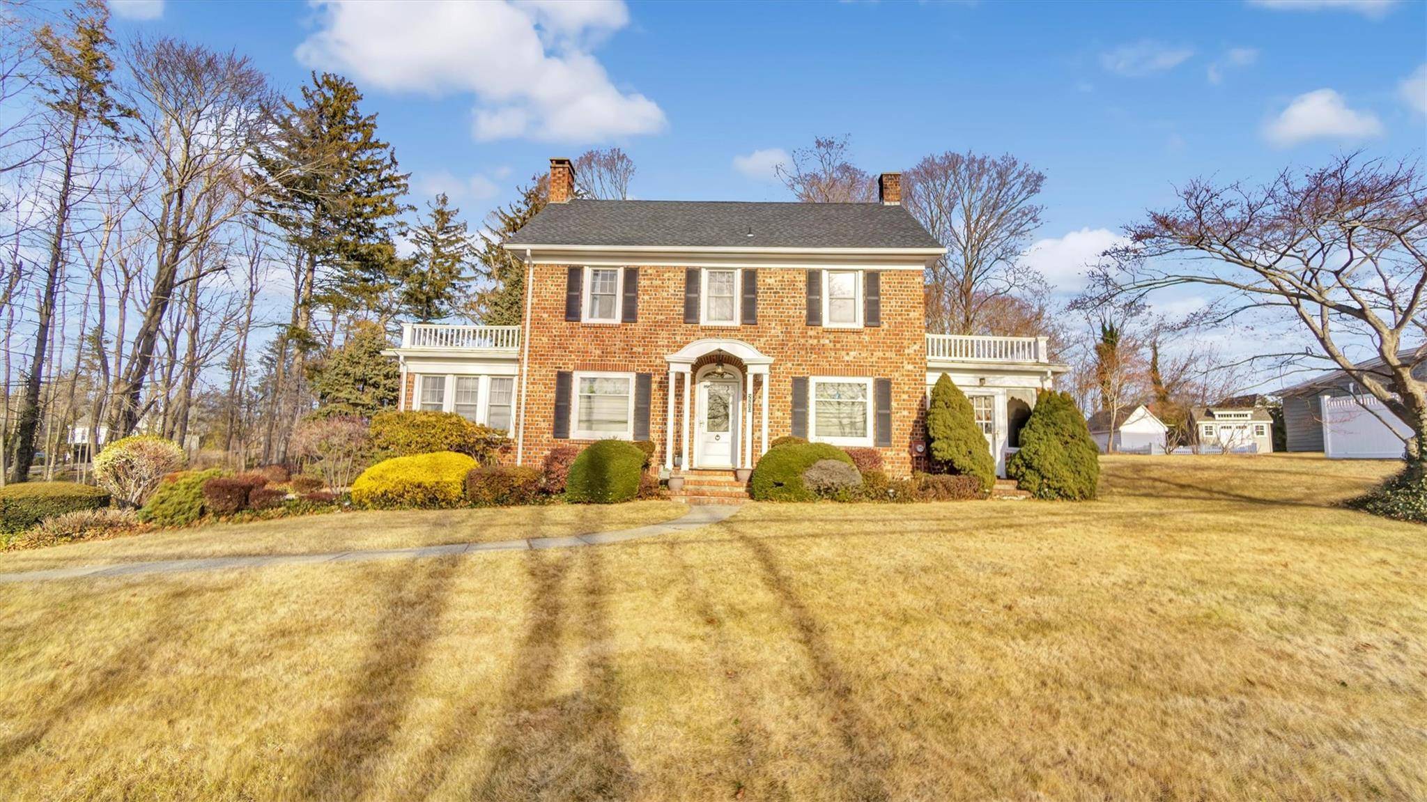 This Brick home is filled with charm on a large property, offering an unbeatable convenient walkable location near restaurants and shopping, beach, public school, and transportation.