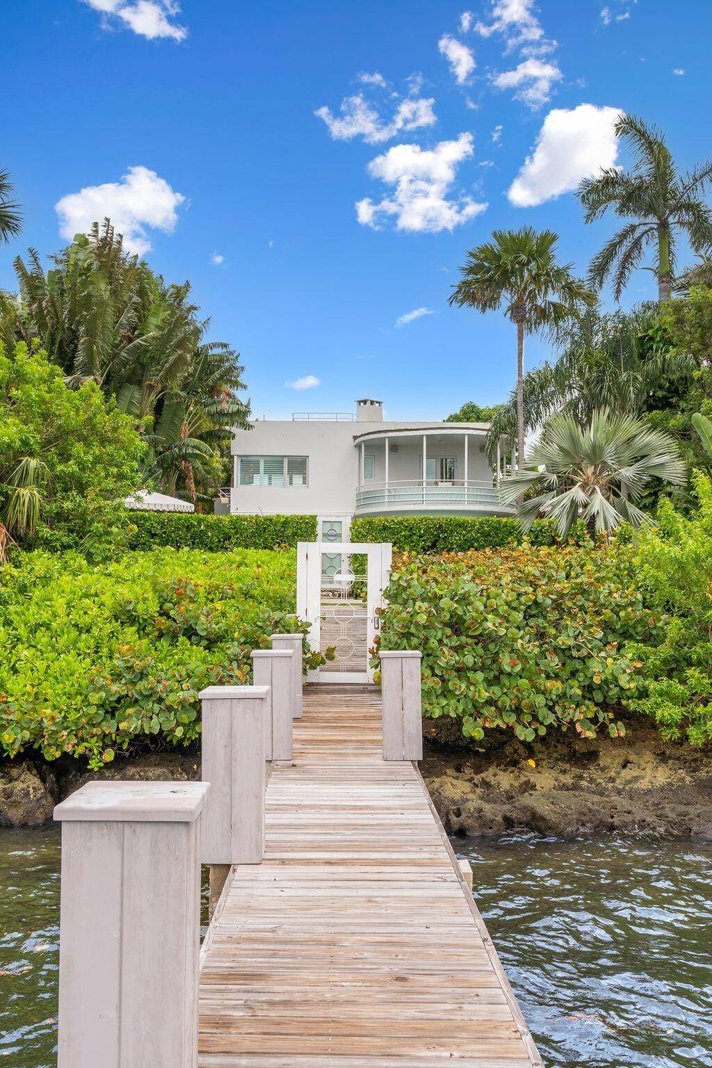 A beautifully renovated, masterful landmark of Modernist architecture, the Boat House combines the very best elements of life in Palm Beach the perfect spot on the lakefront with dock and ...