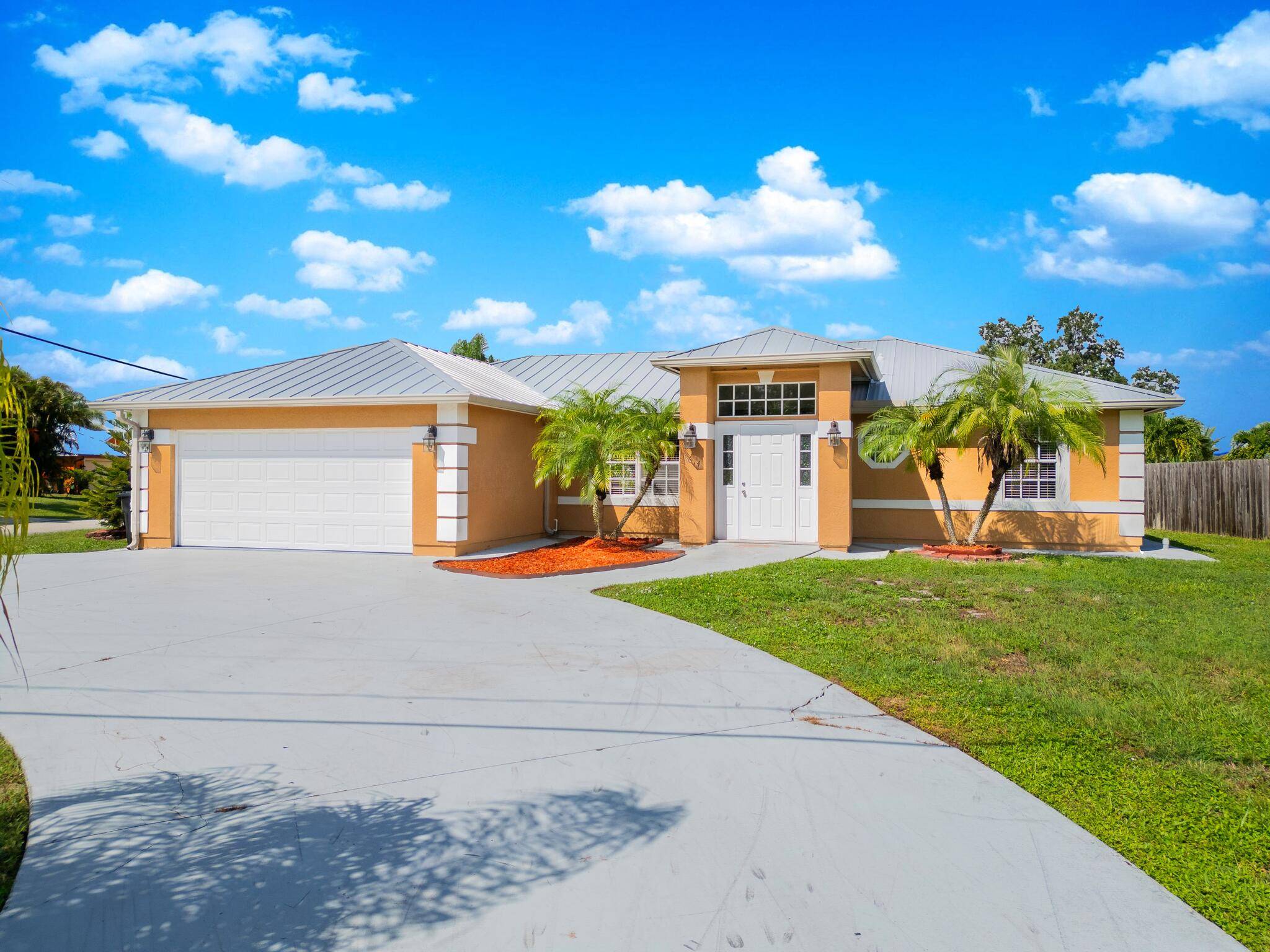 Welcome Home to this huge corner lot, 3 bedroom 2 bathroom home only minutes away from Jensen Beach !