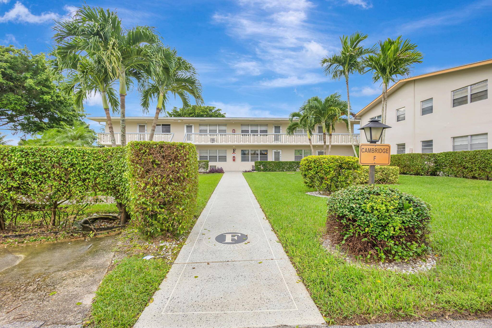 Welcome to 130 Cambridge F, a desirable ground floor condo in Century Village West Palm Beach.