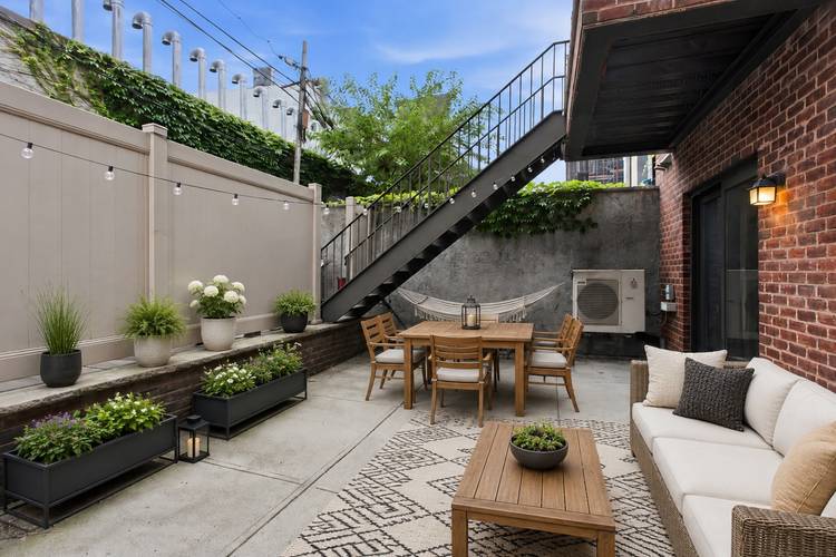 Welcome to your Prime Williamsburg home with a Private Backyard !