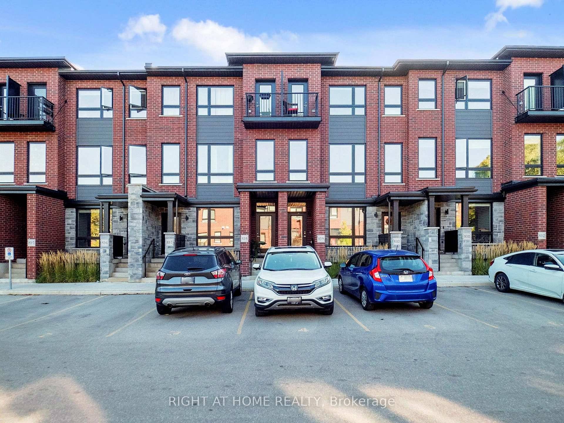 Welcome to this beautifully designed stacked condo townhouse, offering 3 spacious bedrooms and 2.