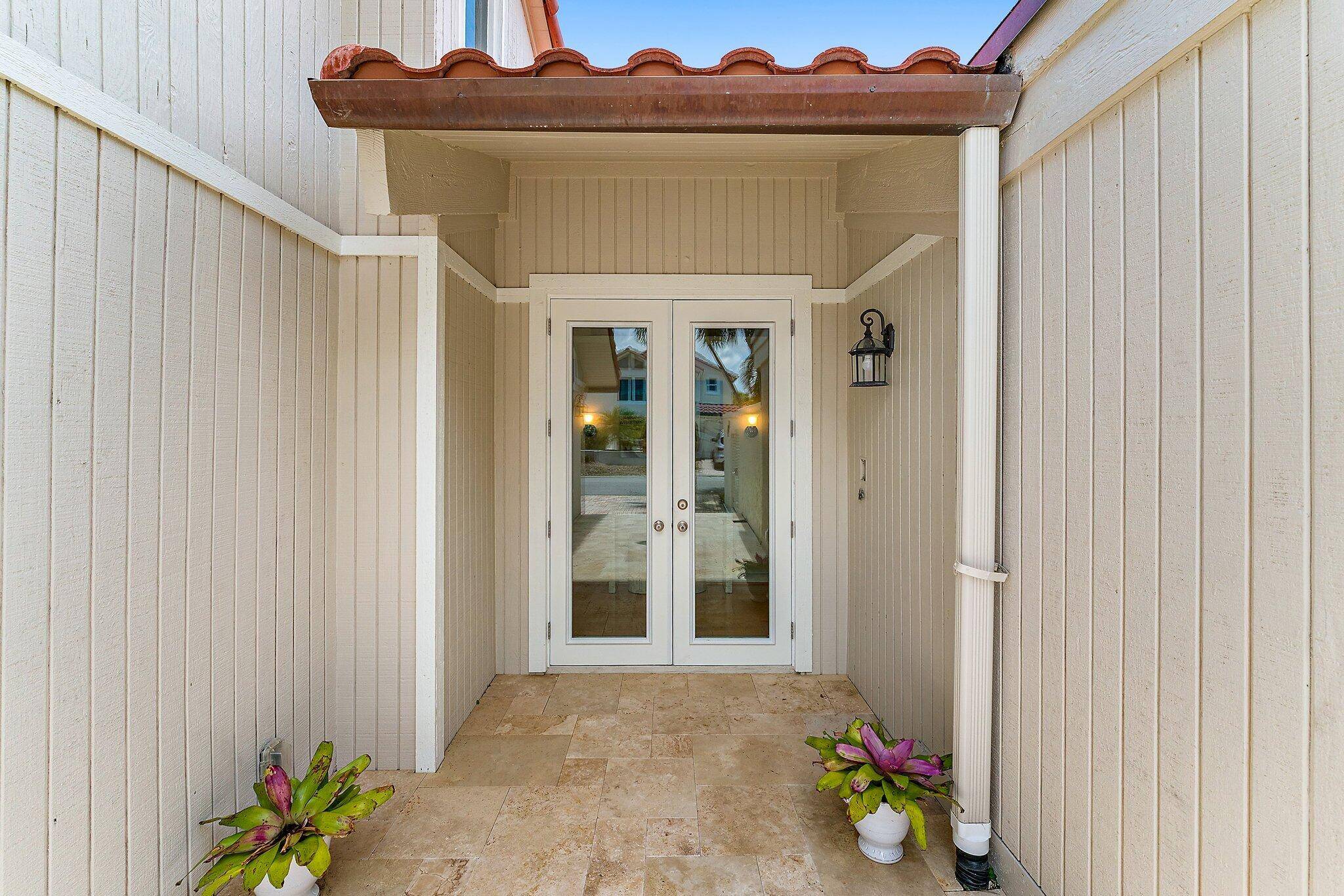 Coastal living in Jupiter welcome to your fully furnished retreat steps from the Atlantic !
