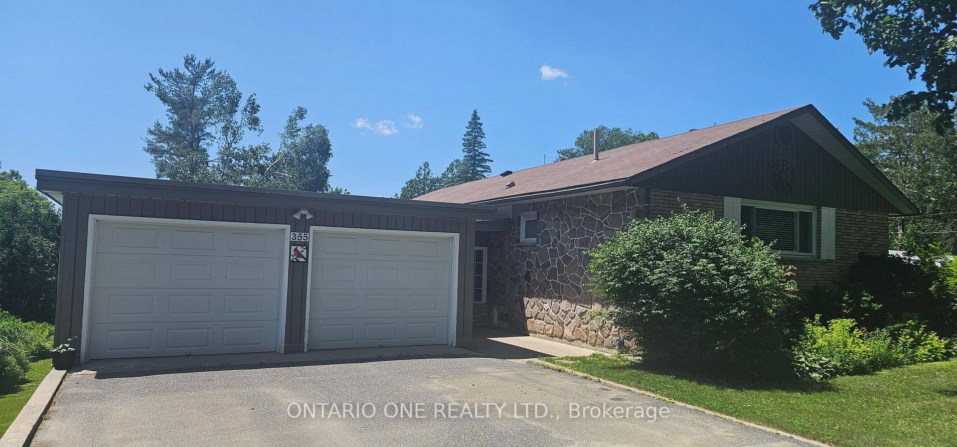 Steps from the Gravenhurst Wharf, this stunning Muskoka retreat sits on a quiet dead end street with breathtaking sunsets and westerly views.