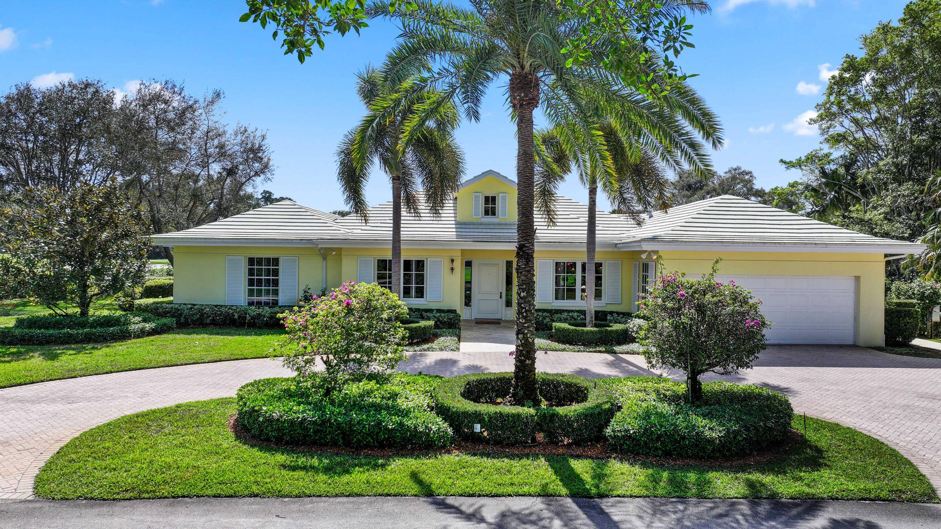 Nestled on a premier golf course lot, this elegant custom residence offers breathtaking Audubon and fairway views and creates an unparalleled blend of sophistication, homey comfort, and tranquility.