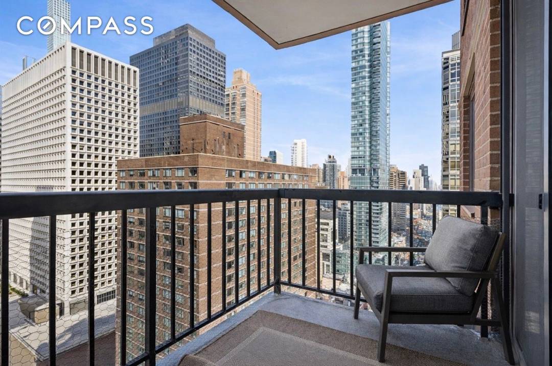 High Floor Living with Iconic Midtown East Views !