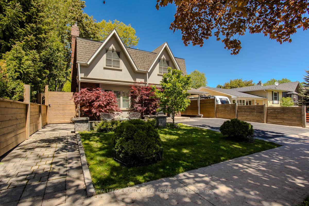 Welcome to your forever home, tucked away on a quiet family friendly street, and backing on to a wooded area, in one of Burlington's most desirable communities.