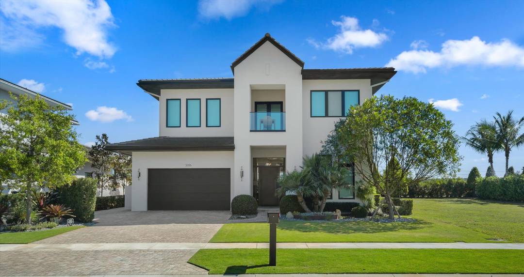 Located in the highly desirable Blue Cypress neighborhood of Palm Beach Polo, this two story residence offers refined modern living on a rare double lot, including the adjacent parcel for ...