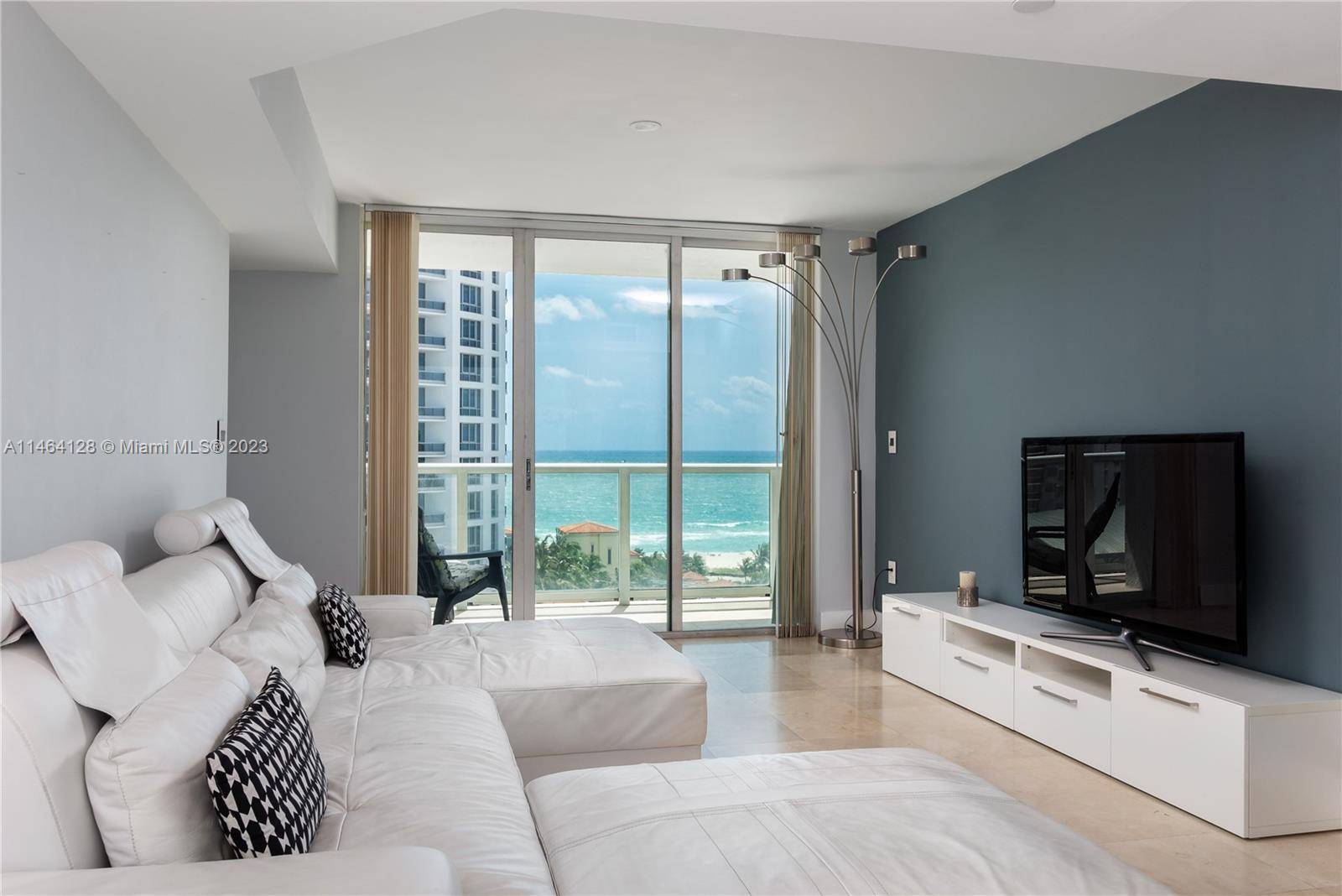 PRICED TO MOVE IN NOW Stunning Ocean and Bay views from every rooms of this 12th floor flow through unit.