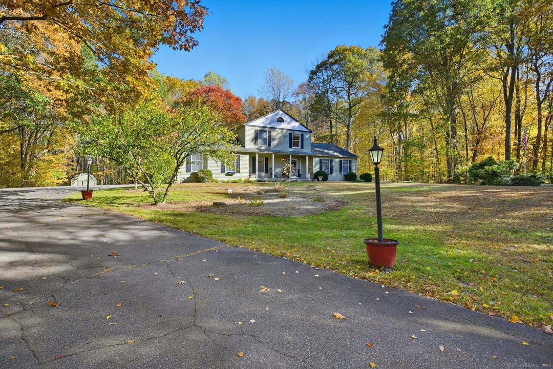 This 2, 400 sq. ft. custom Colonial has all the perks pool, patio, and a backyard made for relaxing or entertaining.