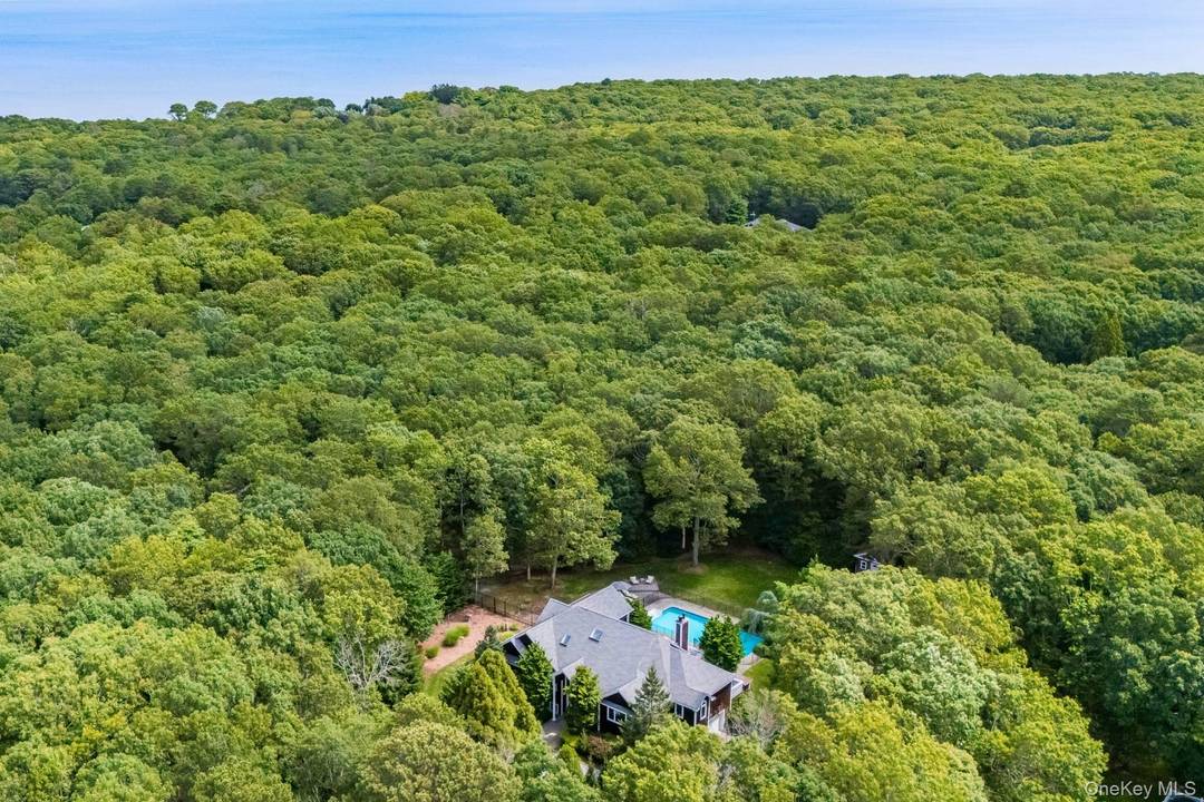 Hampton Bays Chic Residence with Pool, Privacy and Style Privately sited down a long drive and surrounded by lush landscaping, this turnkey 4 bedroom, 4 bath home offers over 4, ...