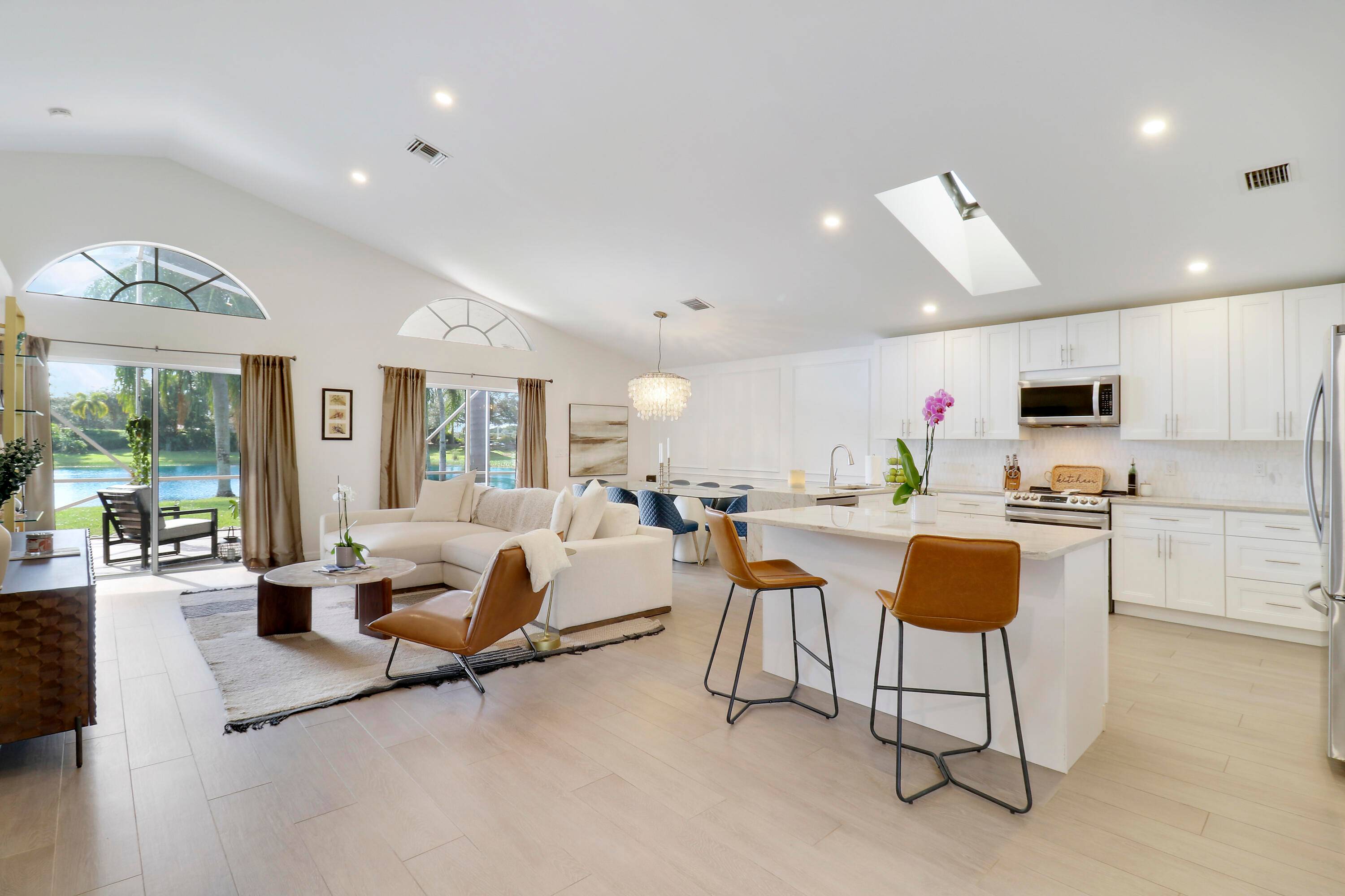 This beautifully designed home seamlessly blends luxury and comfort, making it the perfect lakefront retreat.