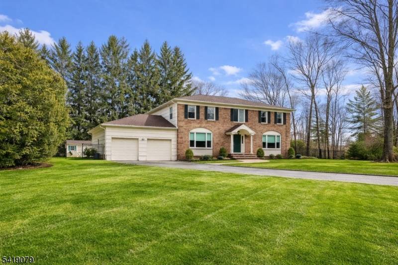 Set on a picturesque cul de sac in the prestigious Convent Station section of Morris Township, this impeccable Center Hall Colonial offers timeless elegance and refined living.