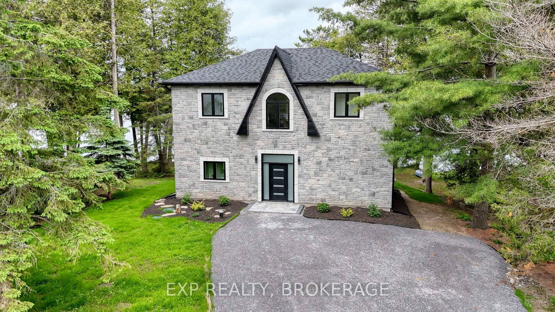 Escape to your custom lakeside retreat at 121B Varty Lake Road, a breathtaking, ICF constructed stone veneer 2 storey home set on the tranquil shores of Varty Lake, just minutes ...