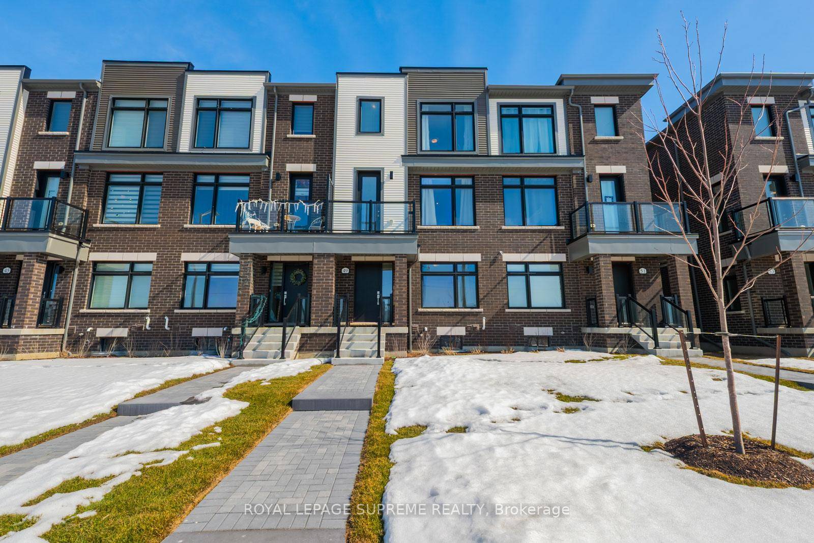 Welcome to 49 Sorbara Way, a newly built 3 storey modern townhome located in the charming community of Brooklin.