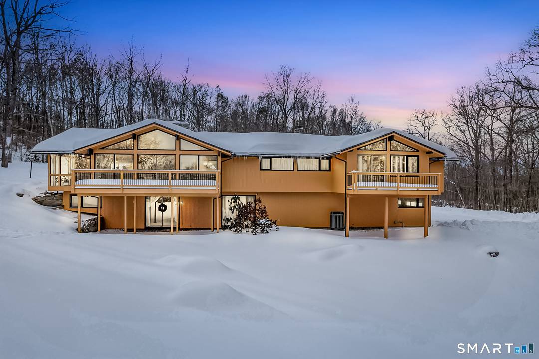 Elegant and truly one of a kind, this modernized contemporary home delivers privacy, sophistication, and lifestyle appeal in one of Litchfield County's most desirable settings an opportunity buyers will want ...