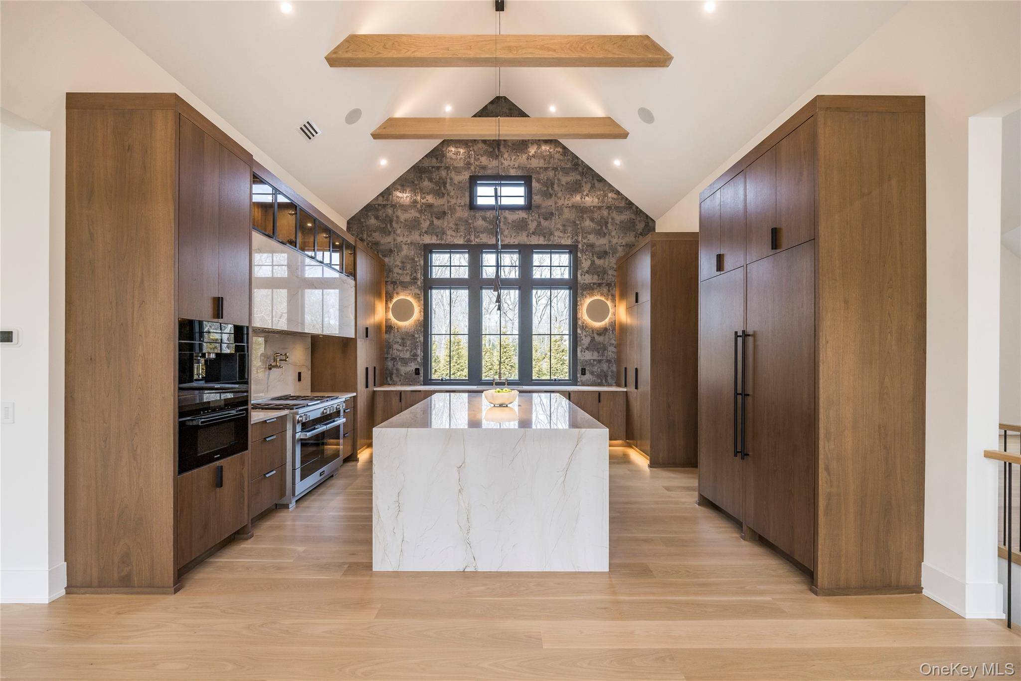 Stunning New Construction in the Hamptons Welcome to 512 Edge of Woods a newly constructed transitional residence offering refined design, modern comfort, and over 7, 520 square feet of beautifully ...