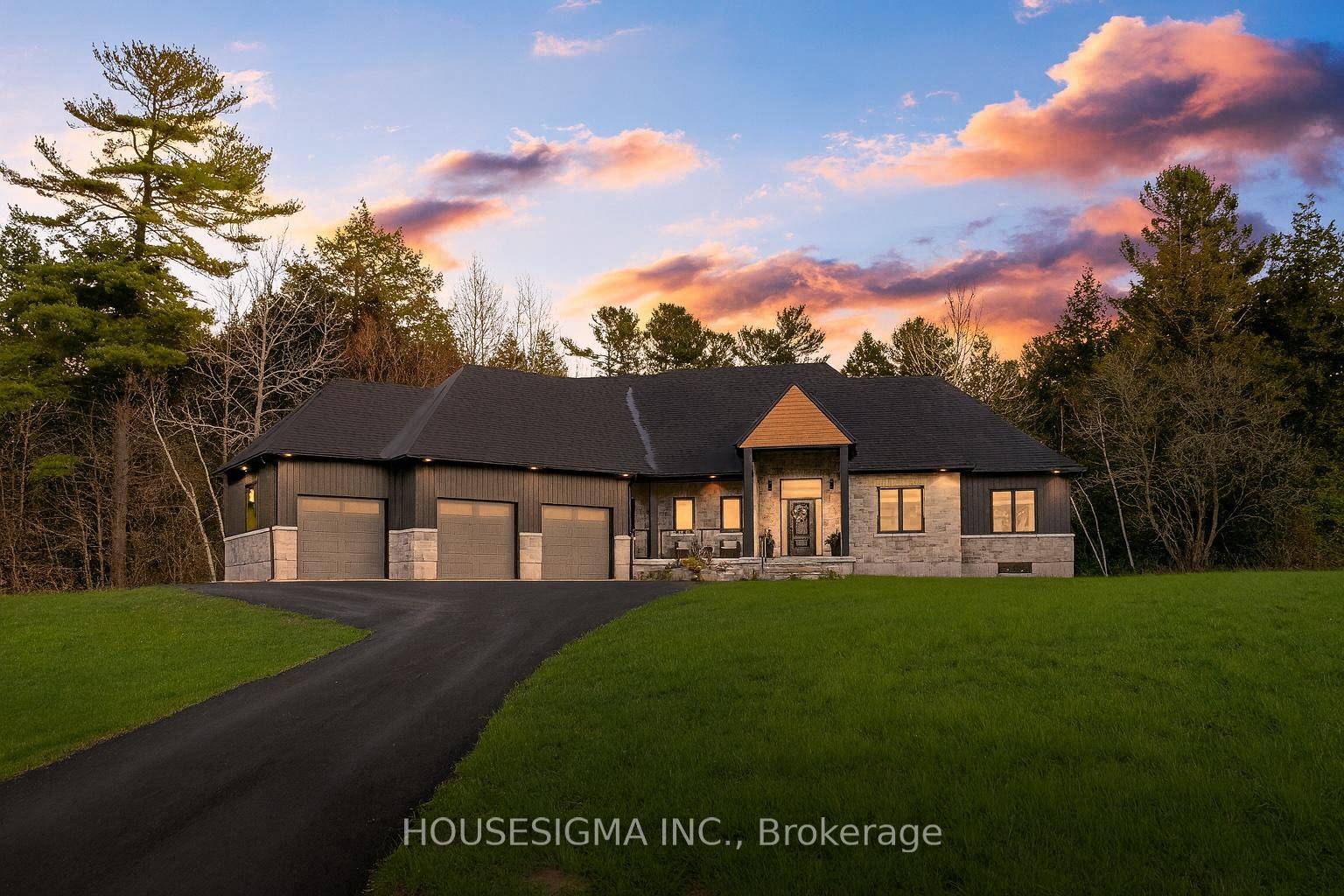 Welcome to this stunning custom built bungalow, perfectly situated on a sprawling lot just under 2 acres.