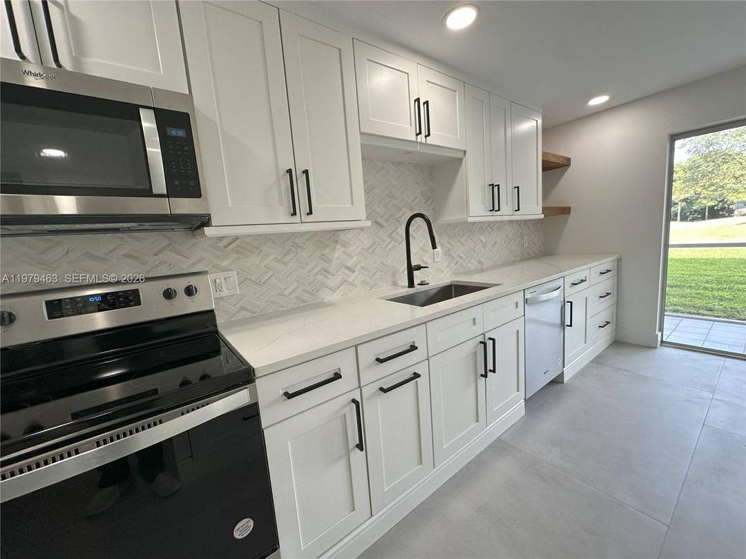 Step into a beautifully reimagined residence where modern elegance meets effortless comfort.