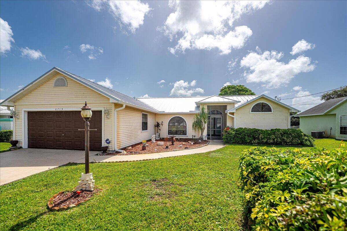 Welcome to this meticulously maintained 3 bedroom, 2 bathroom home nestled in one of Port St Lucie's most sought after neighborhoods.