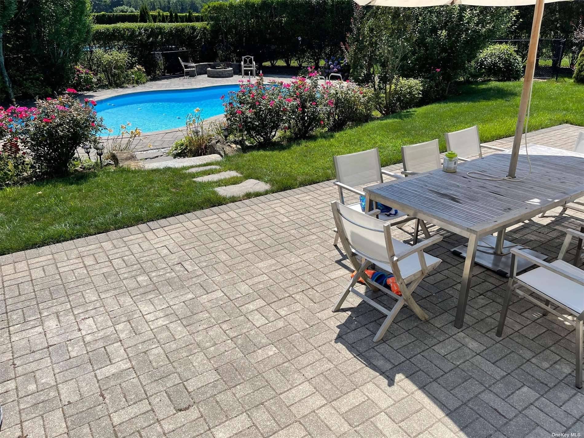 Post Modern with Saltwater heated Inground pool and deeded sound beach rights.