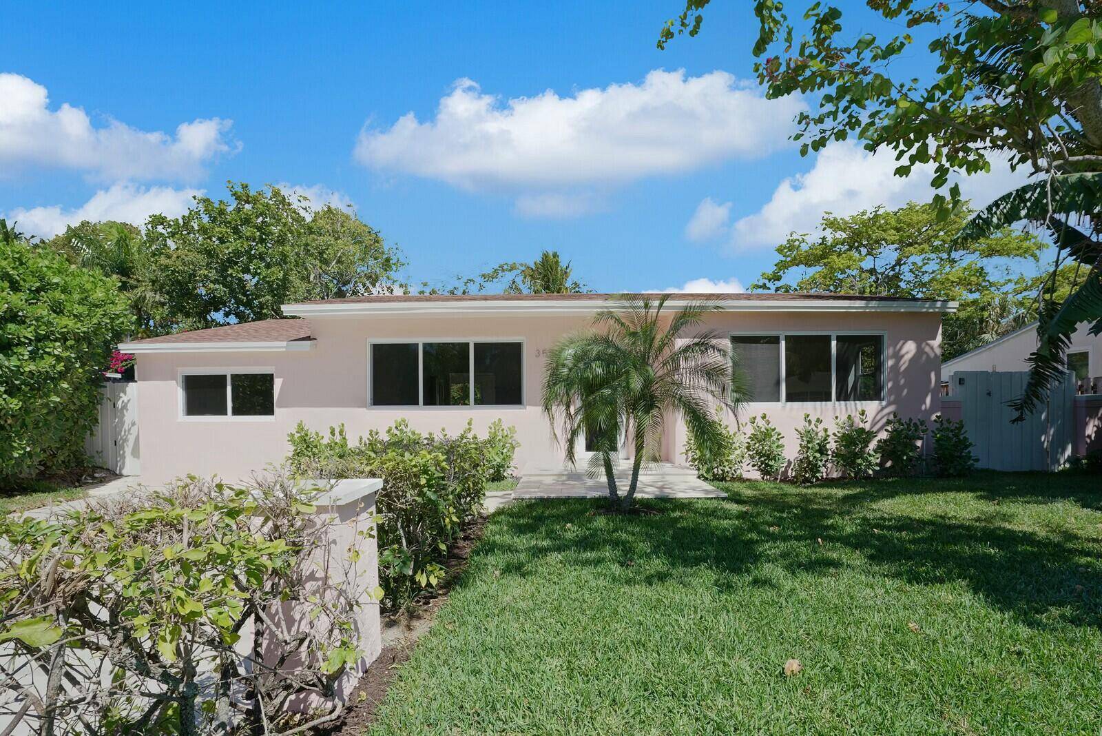 Welcome to this impeccably renovated 3 bedroom, 2 bathroom home located in the coveted SoSo neighborhood of West Palm Beach.
