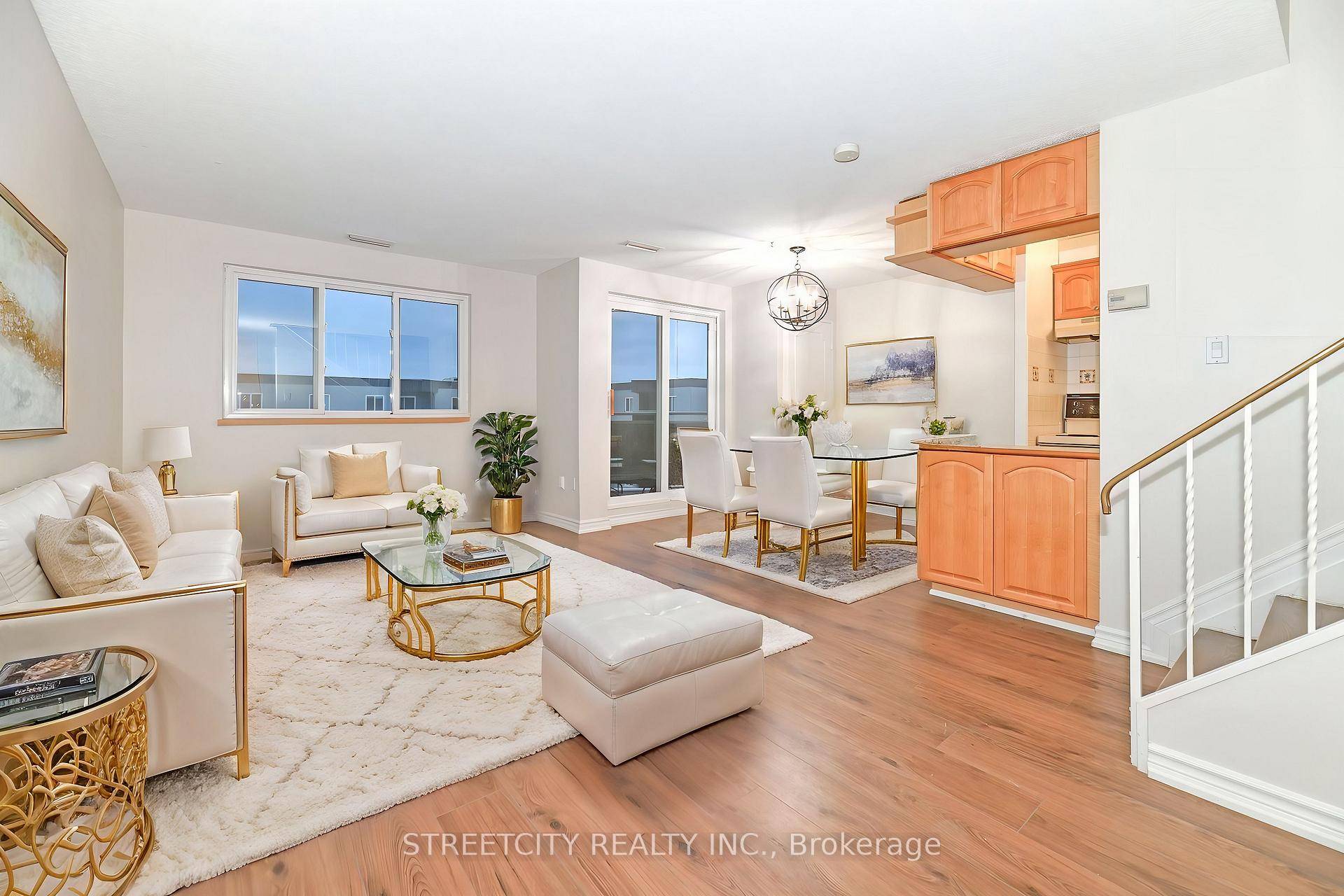 Welcome to this bright and spacious two storey corner unit, ideally situated in the heart of vibrant Clarkson Village.