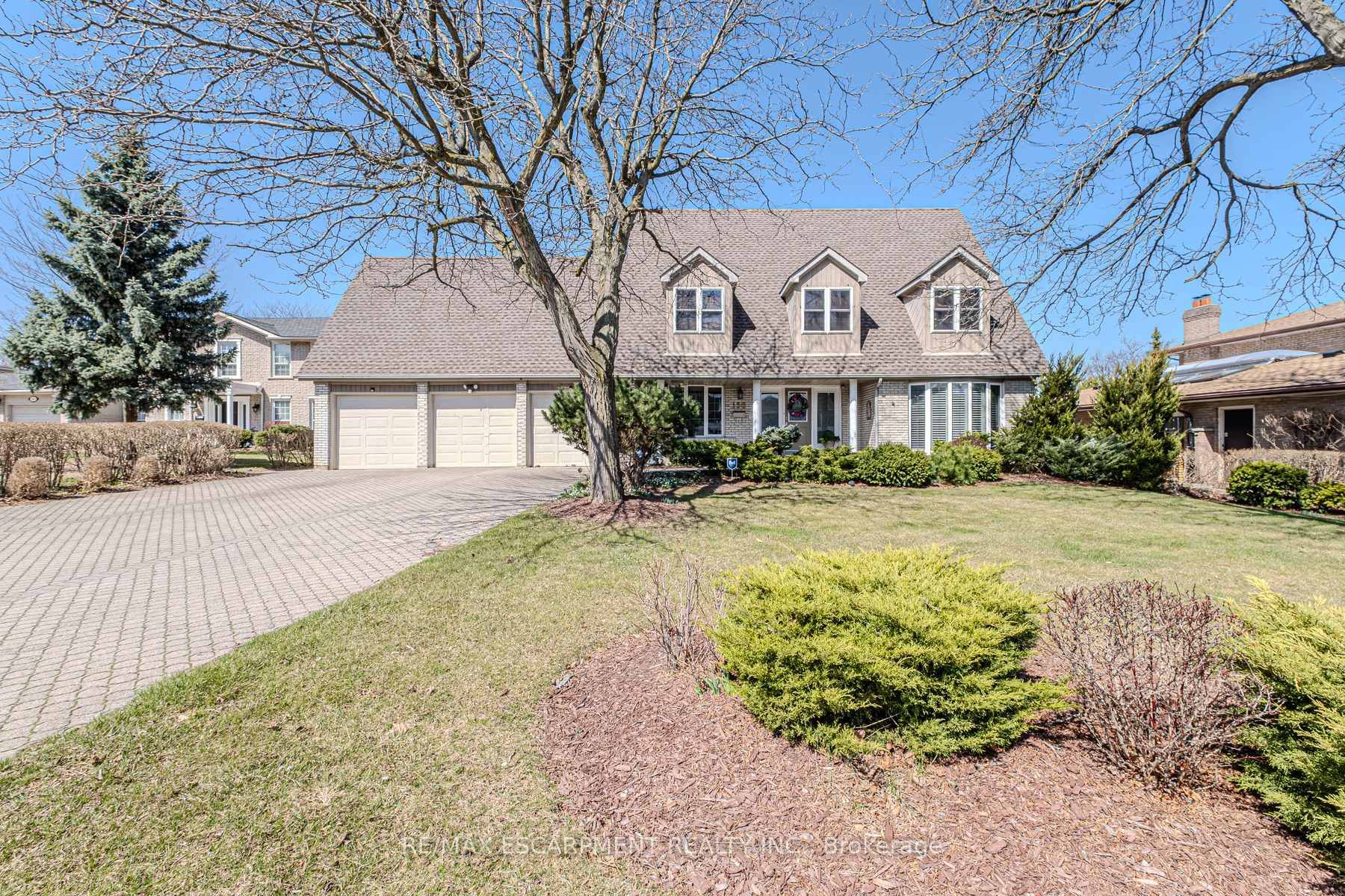 Welcome to 136 Country Club Drive, a timeless Cape Cod style home where classic elegance meets modern comfort.