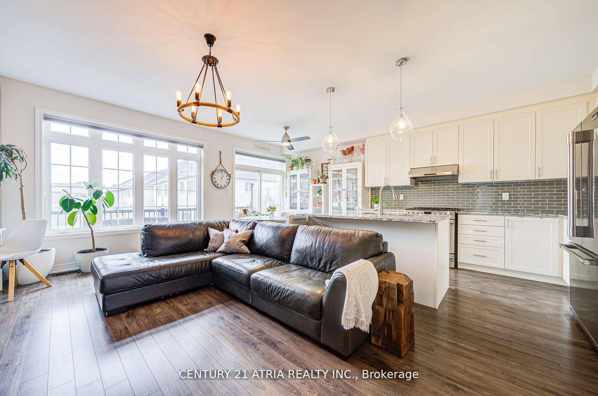 Rare 3 1 Bedroom End Unit Freehold Townhome with 2 Car Garage in Sought After Sharon !