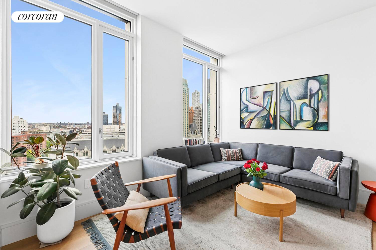 Welcome to Residence 16B at One Clinton, a sophisticated 907 sq ft one bedroom, one and a half bath home offering serene northeast views over Cadman Plaza Park.