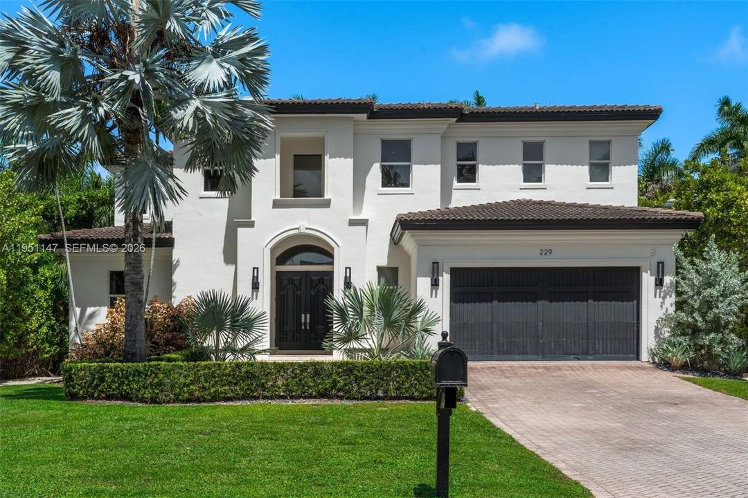 Located in the exclusive, guard gated town of Golden Beach, this elegantly fully renovated 2 story home offers luxury living at its finest.