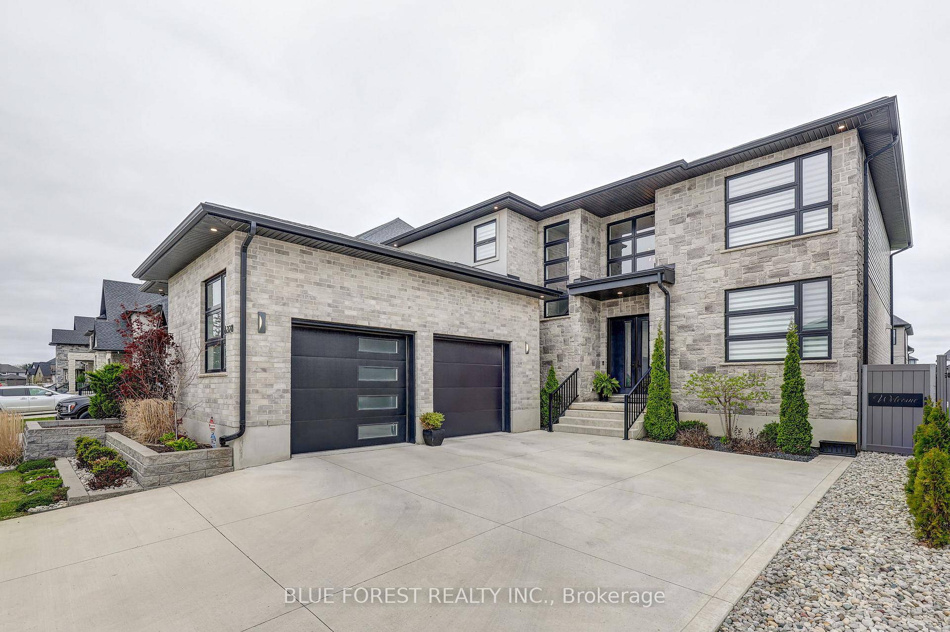 This masterpiece offers over 5000 sq ft of finished space, featuring a Control4 smart home system, a gourmet kitchen with butler's pantry, hardwood floors, a lower level bar kitchenette and ...