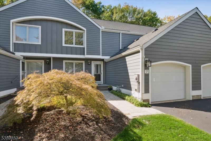 Experience refined townhome living in the prestigious Woodside community, where thoughtful design meets everyday comfort.