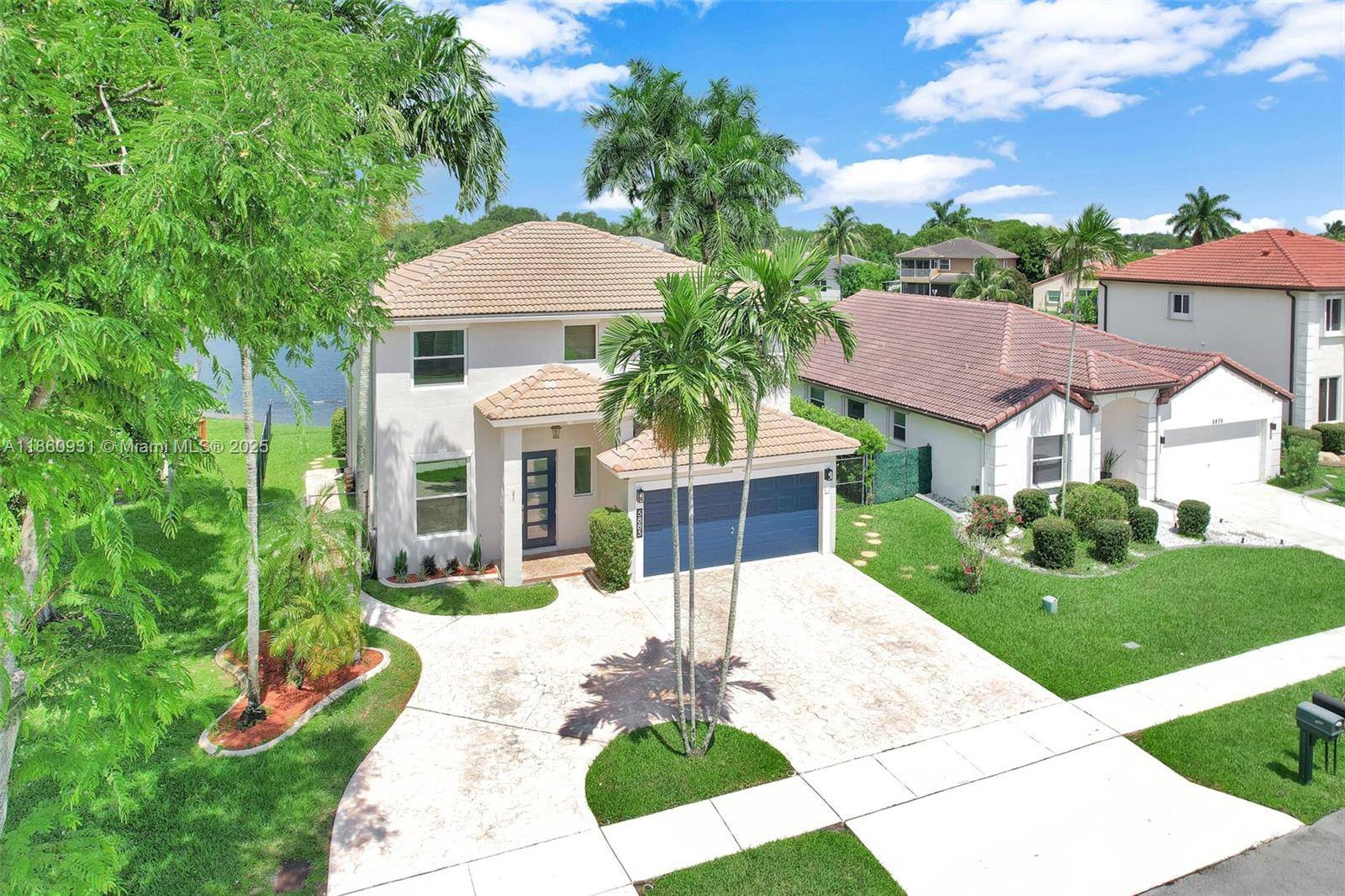 WATERFRONT TWO STORY HOME IN STIRLING PALM ESTATES.
