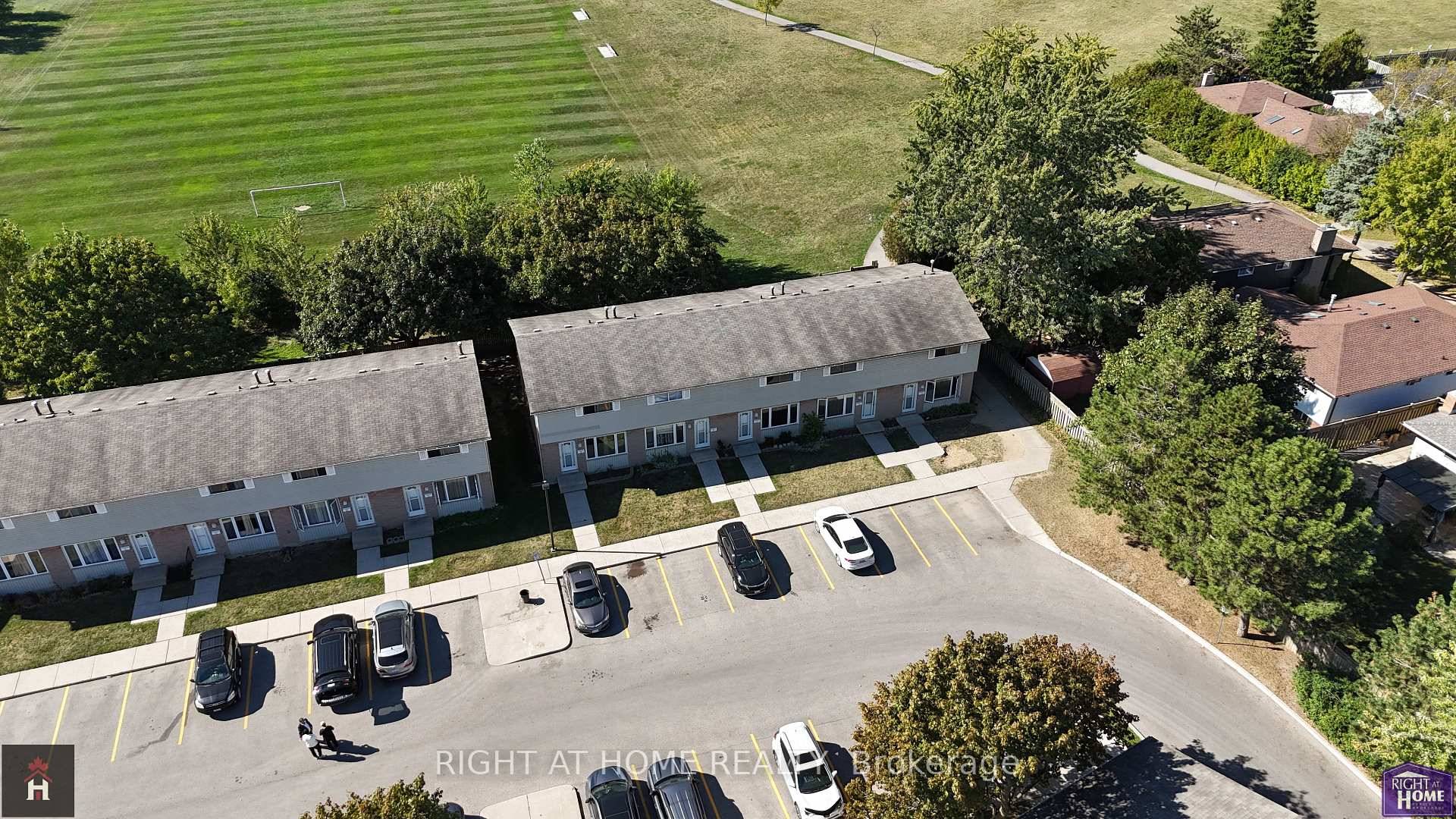 Welcome to this bright and inviting end unit townhouse, tucked away at the back of a quiet, well kept community that offers both privacy and a true sense of neighborhood ...
