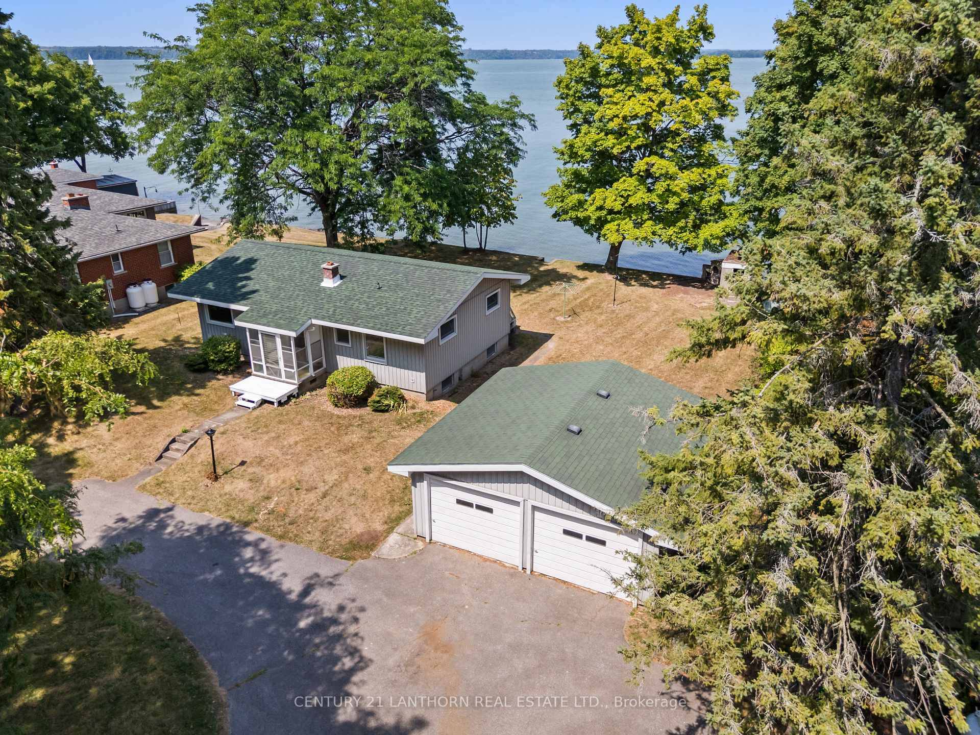 Spend your days watching the sailboats drift by at 11468 Loyalist Parkway ; your gateway to relaxed living !