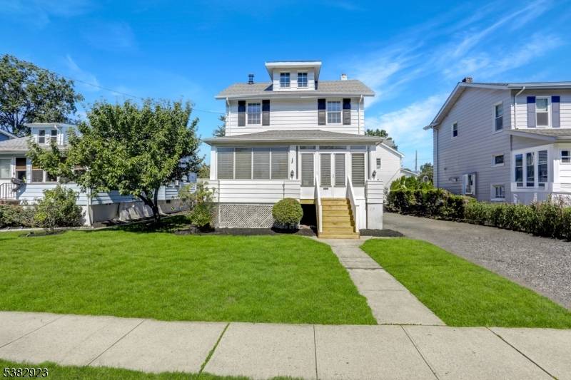 First time available, not in a flood zone, updated open and bright south side Cranford.