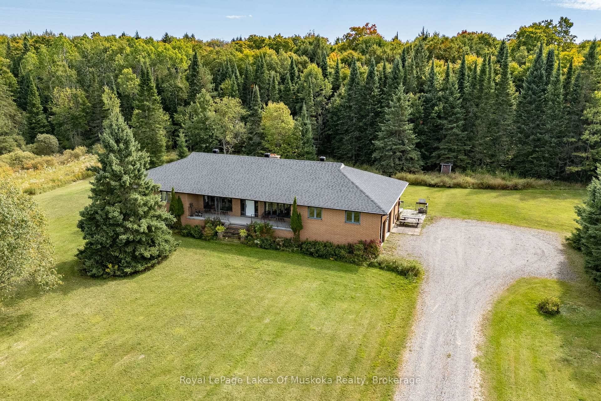 Custom built one owner brick bungalow positioned on a prime 101 acre property in a gorgeous rural area conveniently located only minutes from Bracebridge on a year round municipally maintained ...