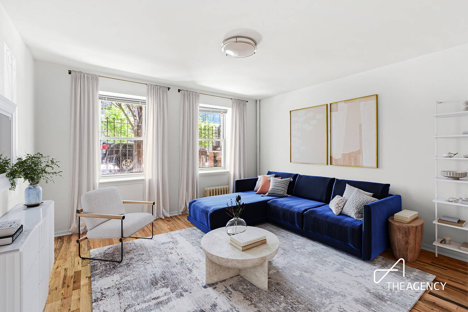 A PRIVATE PATIO overlooks a lush garden in this renovated and sprawling one bedroom home.