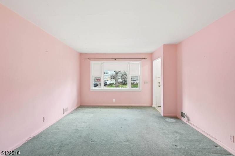 Endless potential awaits in this well located home set on a 0.