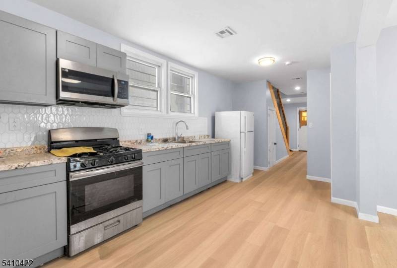 Fully renovated, move in ready home featuring 5 bedrooms and 3 full bathrooms.