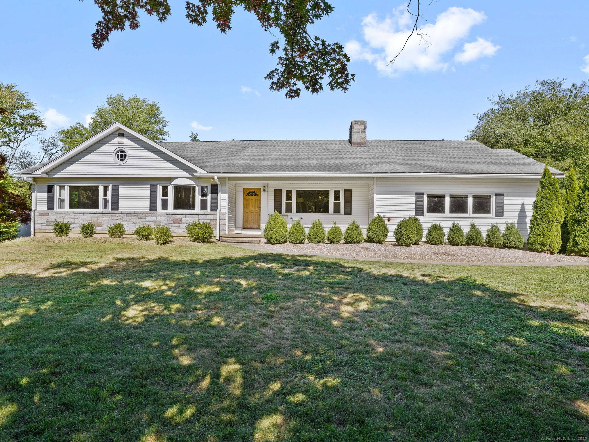 Spacious 3 bedroom ranch with in ground pool and sweeping property in the heart of Easton.