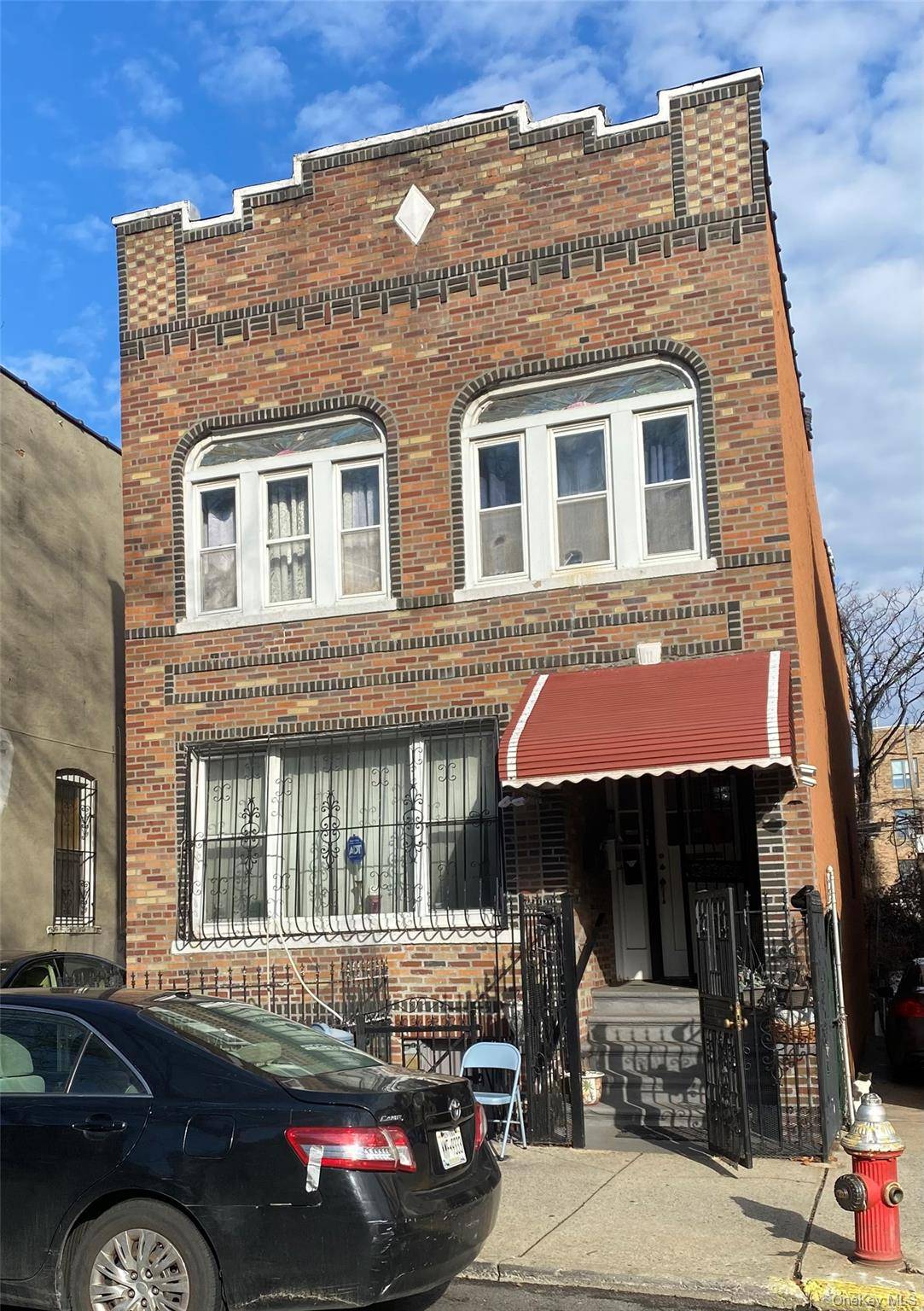 Detached all brick three family building full basement with front and rear access and a detached two car garage on a 25X100 lot 2500 sq ft, This is a prime ...