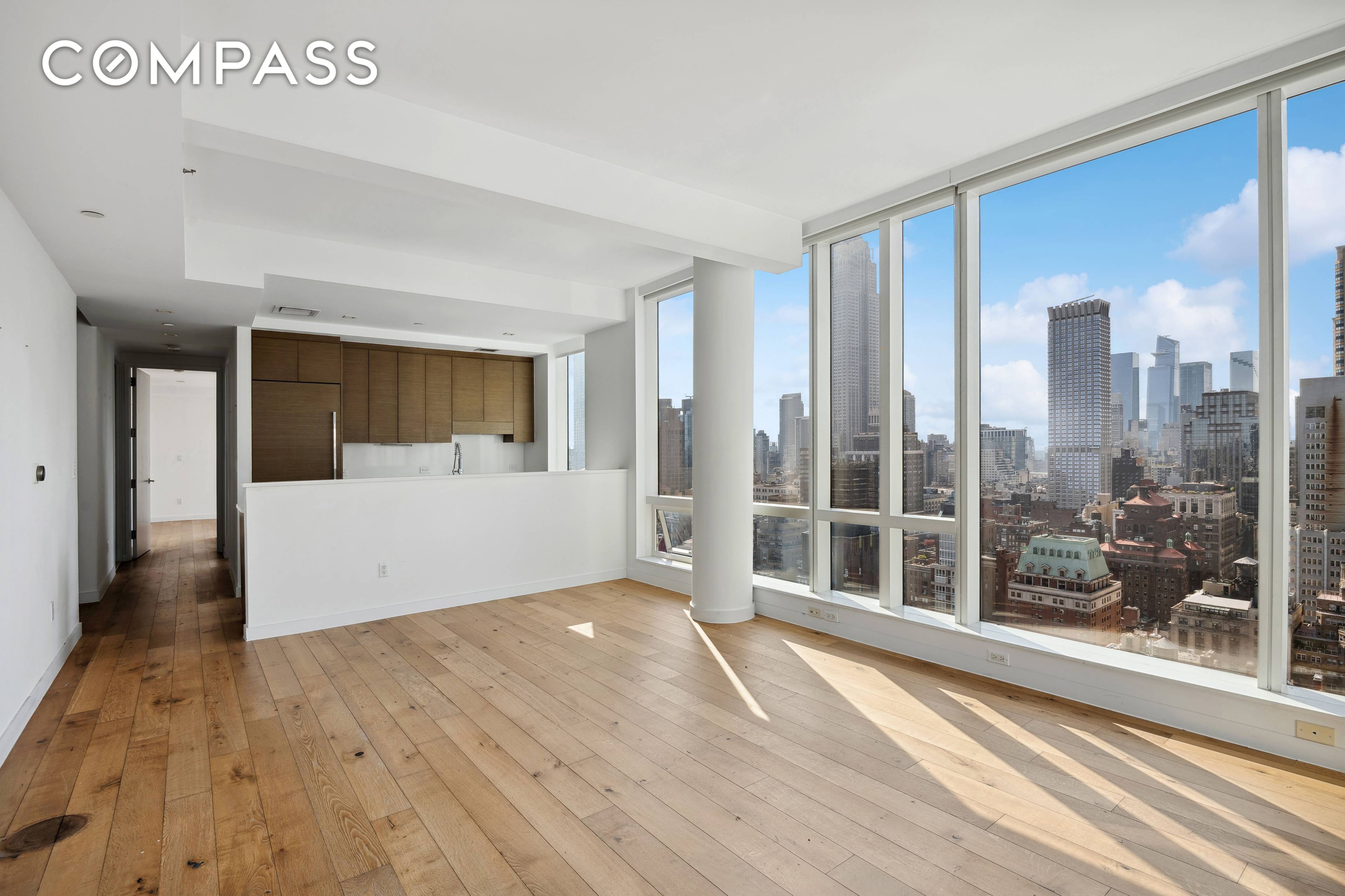 Occupying the entire western wing of the building, this exquisite two bedroom residence boasts abundant natural light, captivating sunset views, and panoramic vistas of the cityscape.