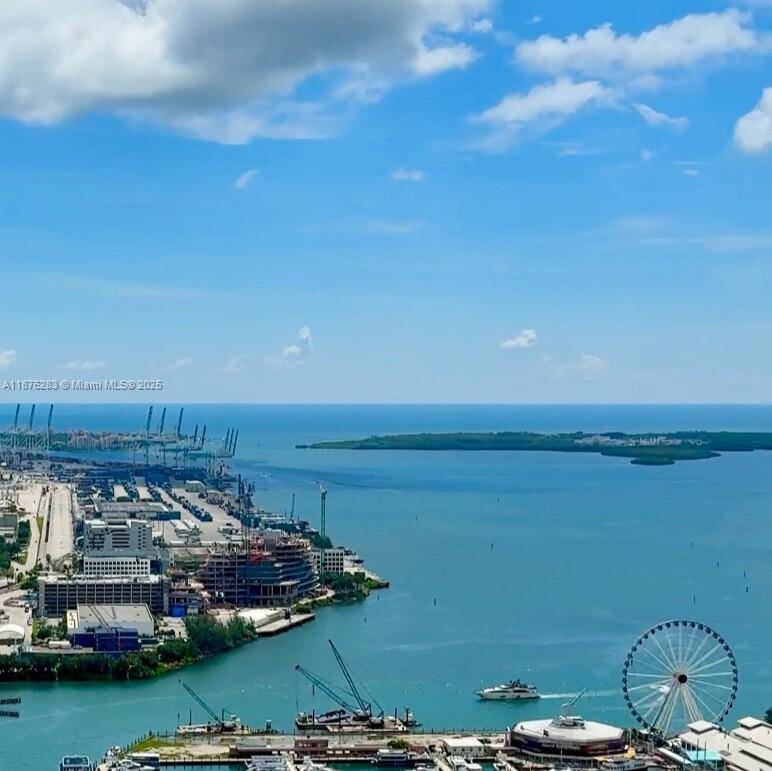 Experience breathtaking views from the 51st floor of Marina Blue, one of Miami s most coveted addresses on Biscayne Boulevard.