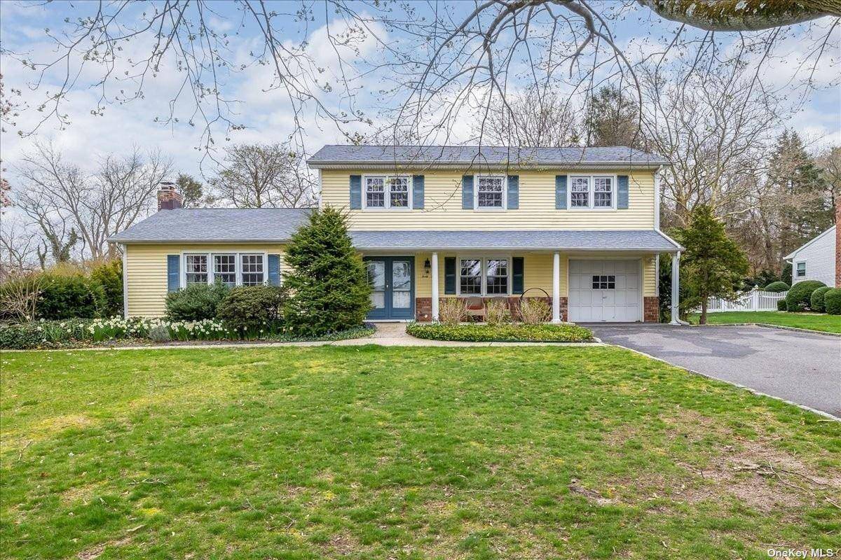 Well appointed, four bedroom, three bath Colonial home on an half an acre of property which backs to Greenlawn Park's beautiful, treed green space perfect for family gatherings.