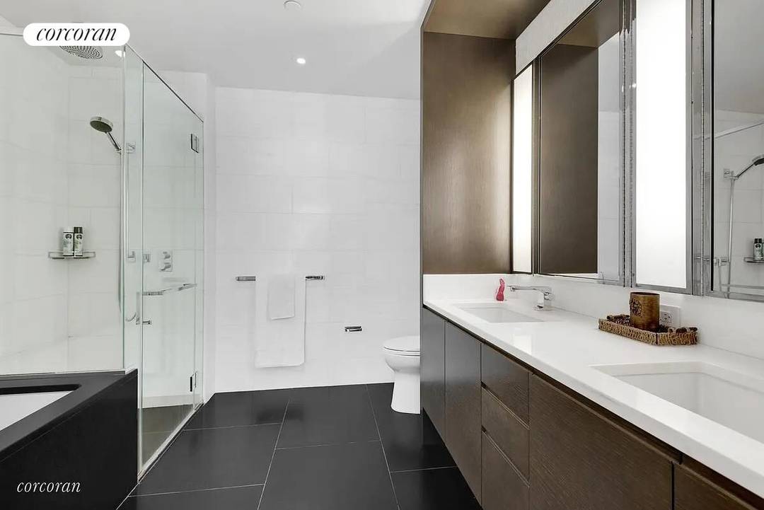 This two bedroom, two and a half bath residence with a dedicated study features excellent East exposure and sophisticated, contemporary interiors by Shamir Shah Design.