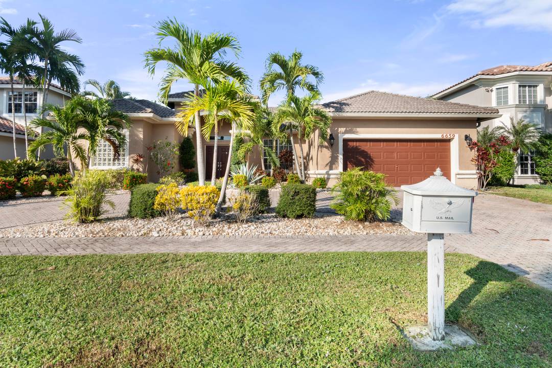 Located in the desirable community of Boynton Waters, this spacious one story, 5 bedroom, 3 bath pool home offers a functional layout with 2, 752 sq ft under air.