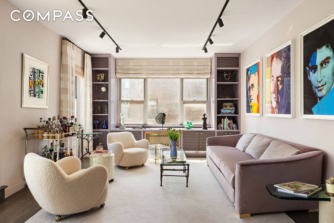 CHIC, SOPHISTICATED PENTHOUSE with two private landscaped terraces and sweeping east and west skyline views.