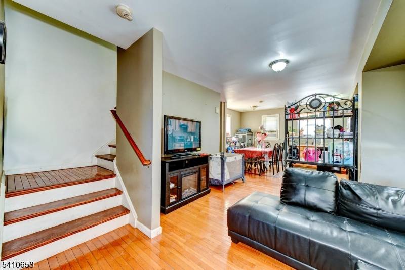 Nestled on a peaceful tree lined cul de sac, this modern Colonial offers the ideal combination of privacy and community.